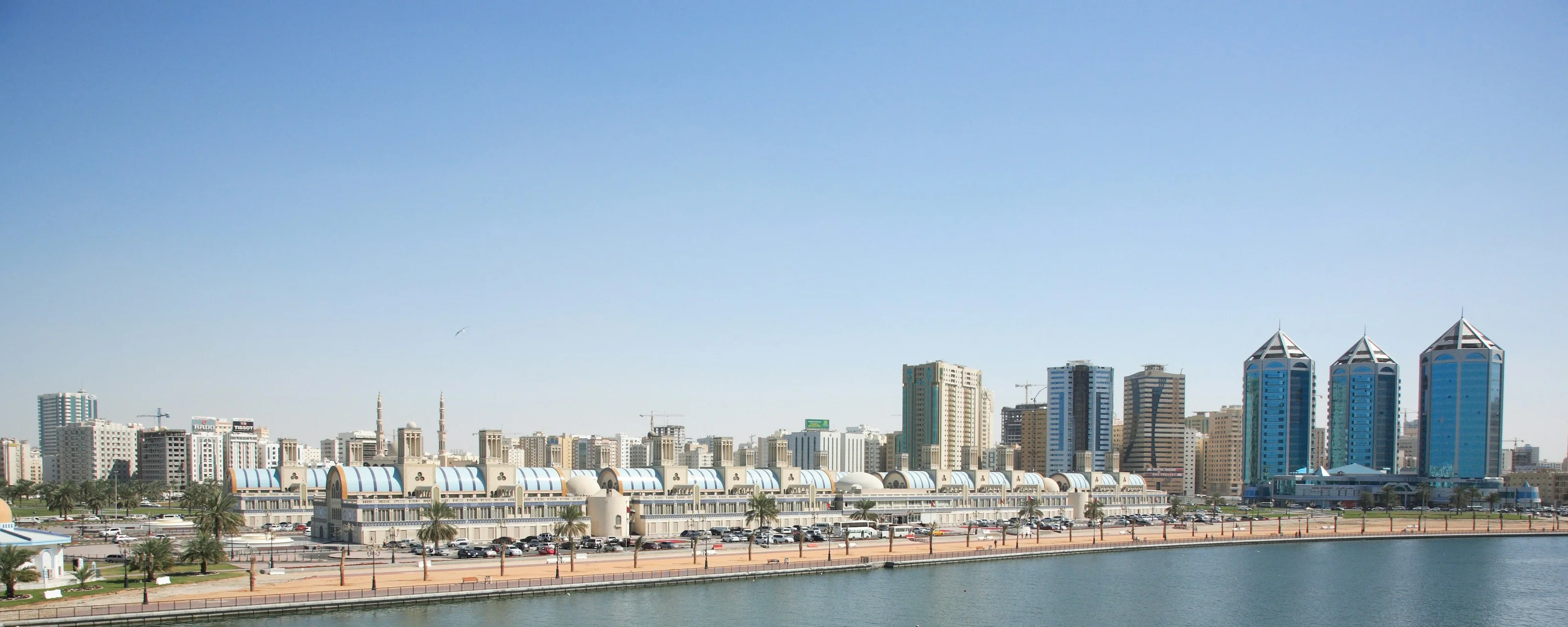 Khalid Lagoon waterfront with the domed Central Souq and Sharjah skyline