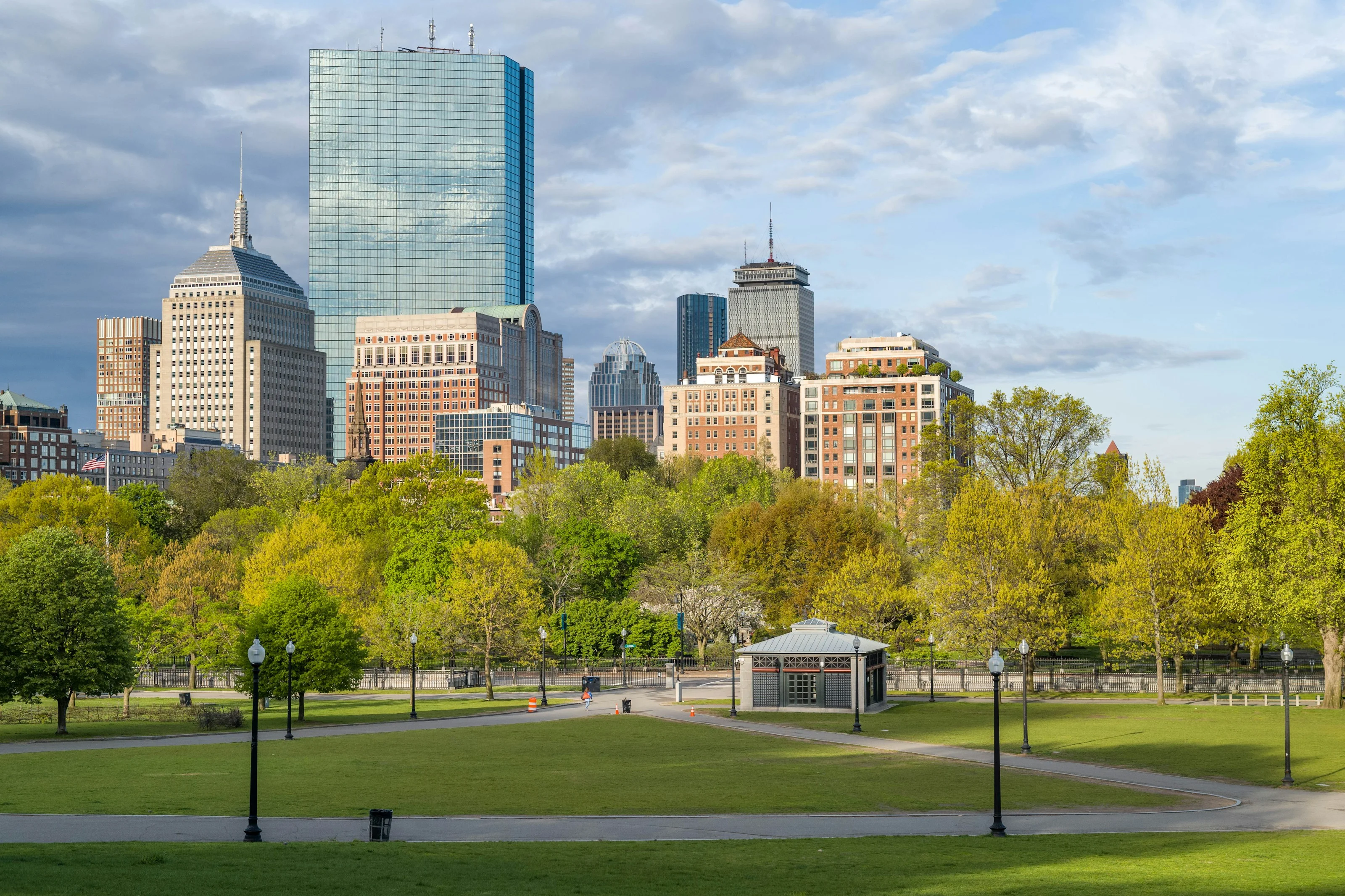 Back Bay skyline rising behind the green lawns of Boston Common
