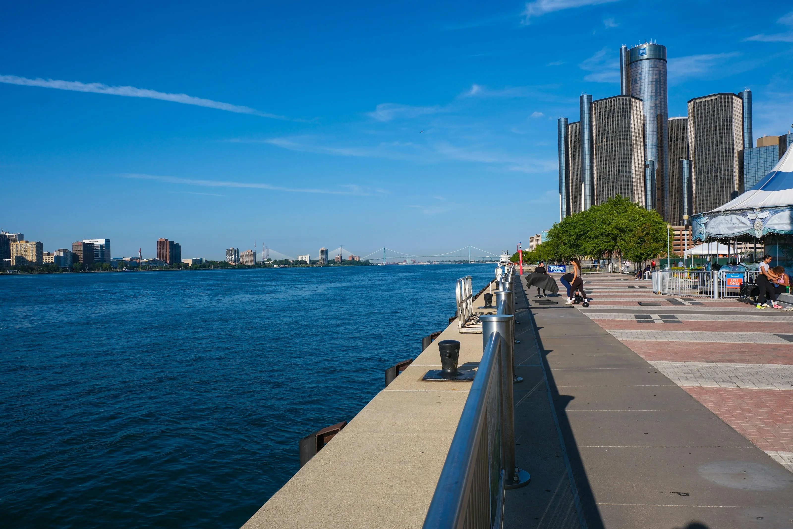 Detroit Riverwalk on a sunny day with the Renaissance Center towers in the background